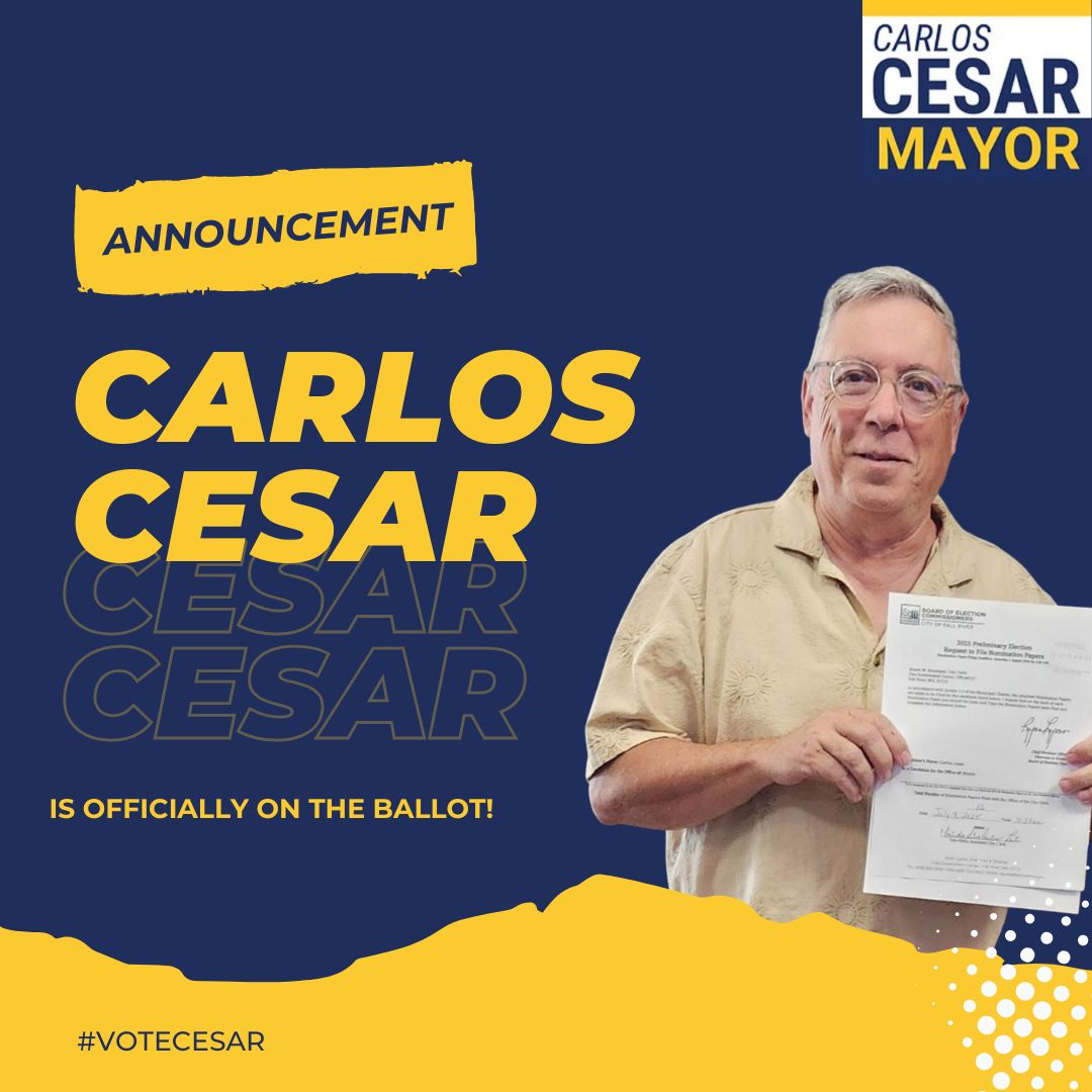Carlos Cesar holding official ballot certification documents from Fall River election office